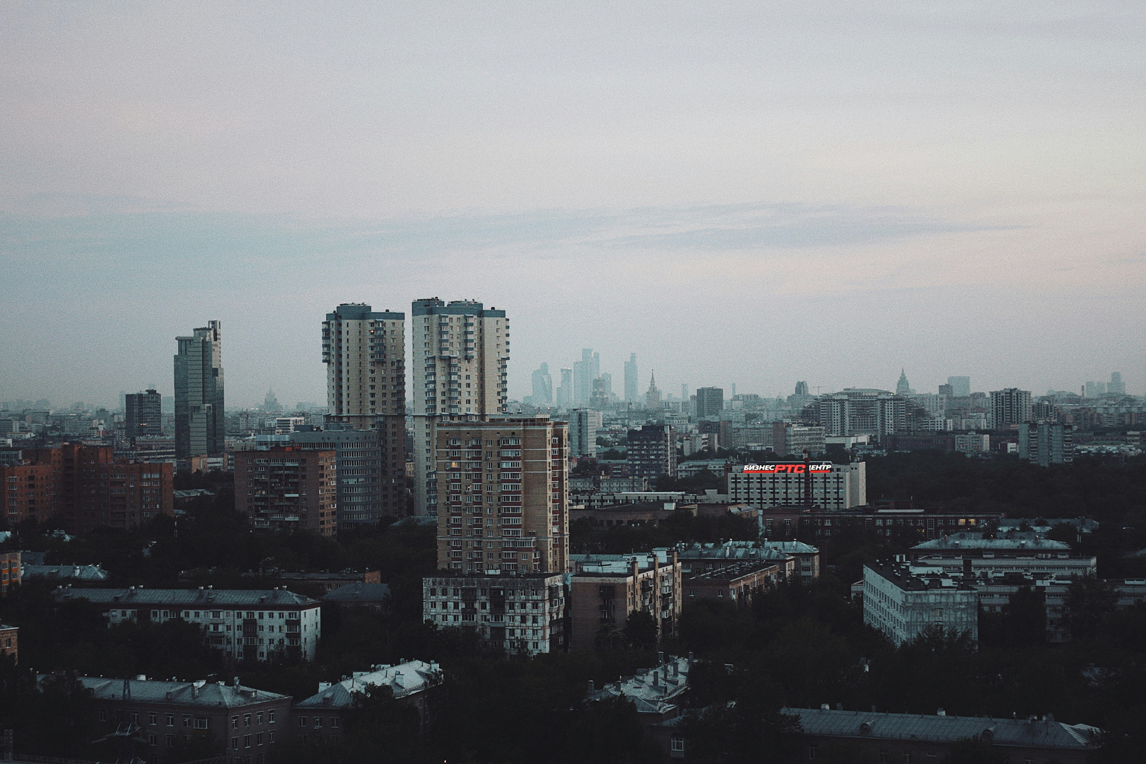 city skyline under white sky during daytime